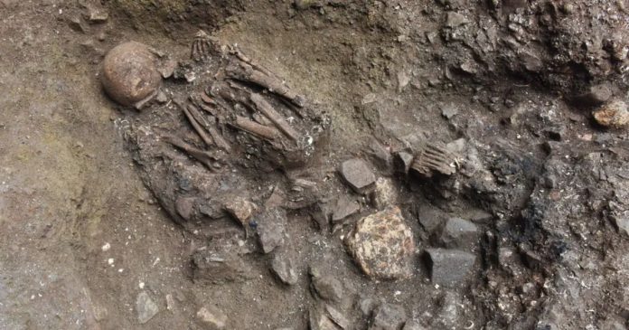 The burial of Xingyi_EN, a woman who died in the Early Neolithic period in Yunnan Province, China. (Image credit: Yunnan Institute of Cultural Relics and Archaeology)