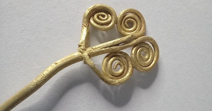 Gold Brooch and Jade Stone Unearthed in Ancient Troy