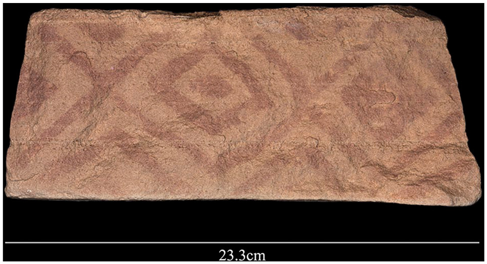 Geometric painted pattern found on a block that formed part of the platform of a mustatil